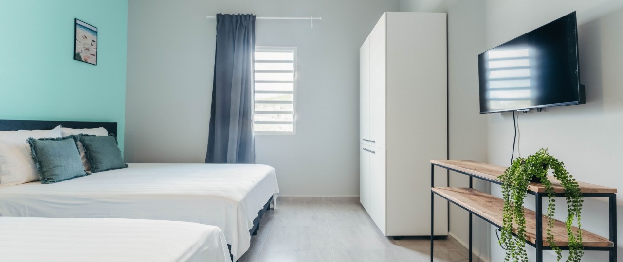 Quarto confortável do bungalow