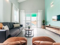 Sala de estar acolhedora do bungalow